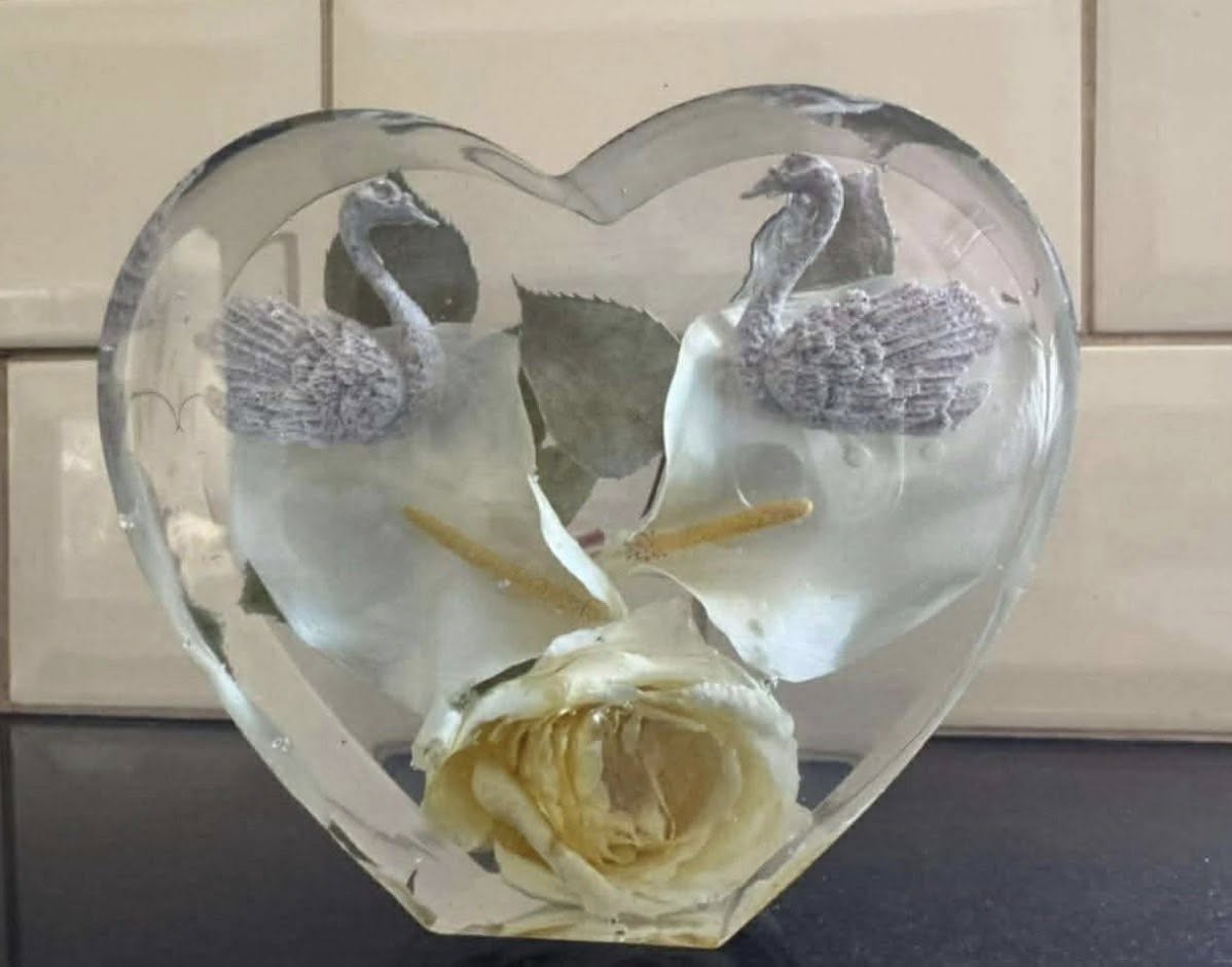 Custom heart keepsake with preserved flowers and decorative swans