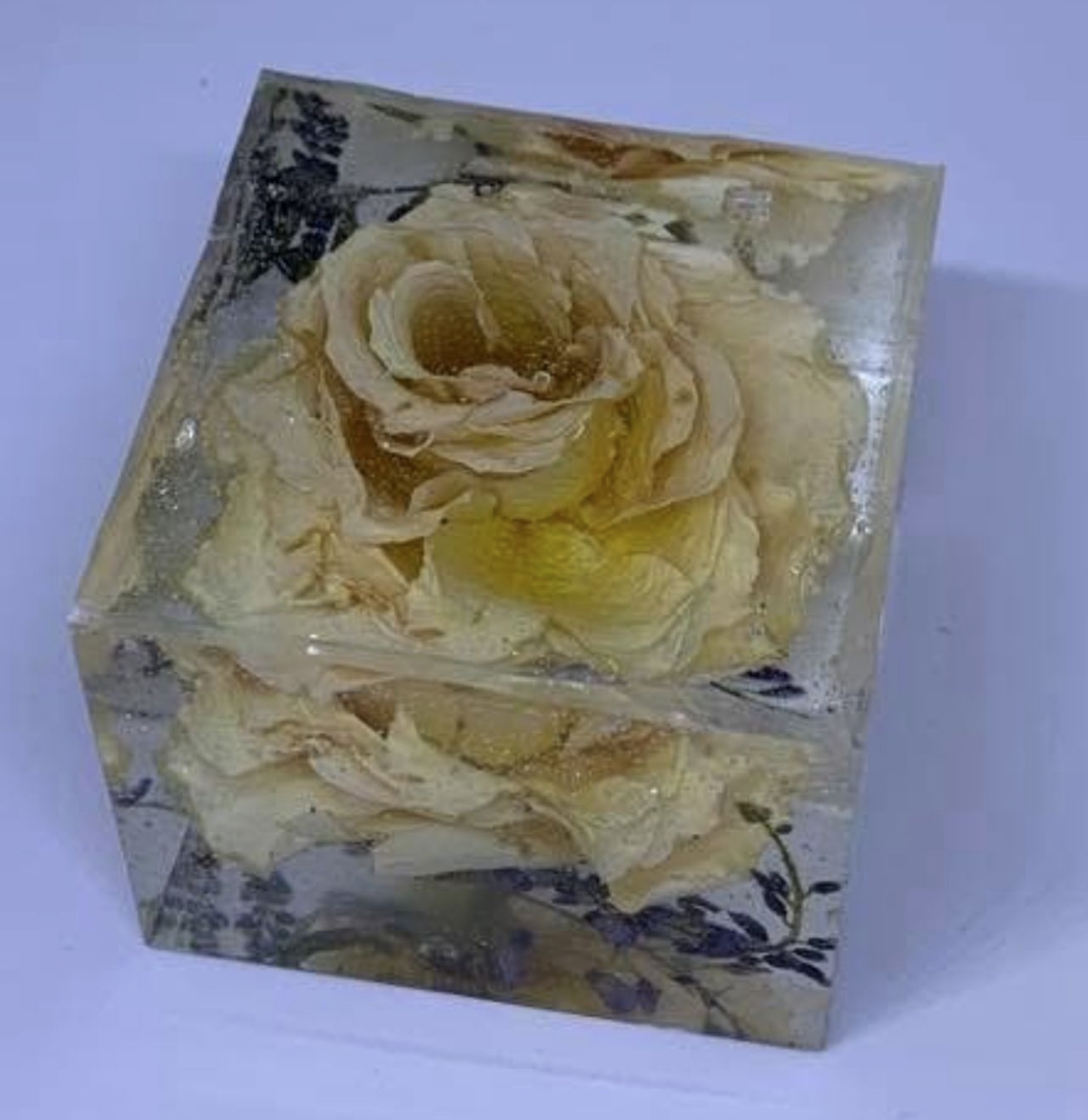 Large resin cube with preserved flower inside